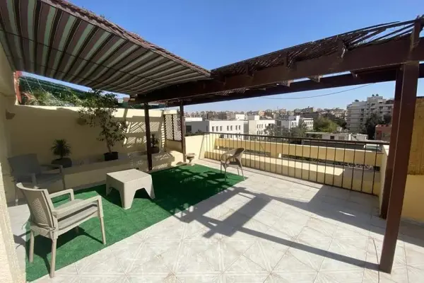 Very neat Roof top Duplex CAC tracocation 3 bedroom 3 bathroom Huge reception Very sunny and bright Semi furnished Green view Large Roof top 01000007460